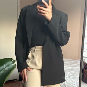 Black blazer with shoulder pads